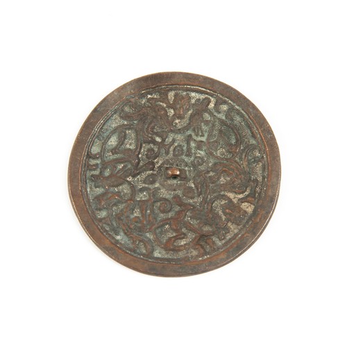 844 - A CHINESE BRONZE MIRROR