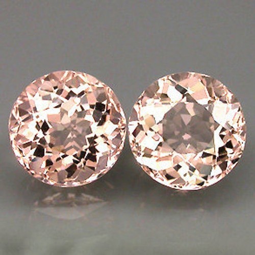 1075 - A PAIR OF UNSET MORGANITES, 4.48 CARATS