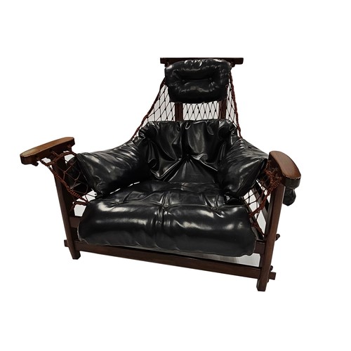 361 - A ROSEWOOD AND LEATHER CAPTAIN'S CHAIR, DESIGNED BY JEAN GILLON