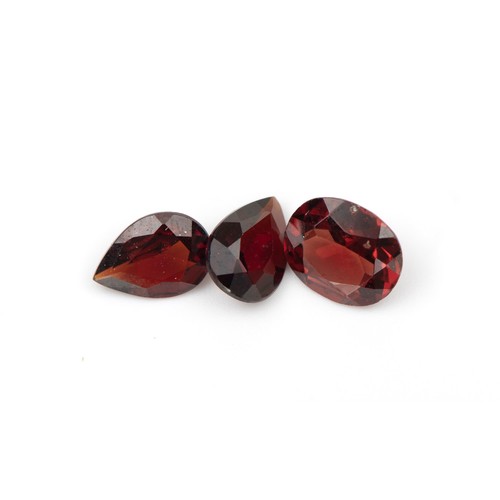 195 - A TRIO OF RUBIES 1.65 CARATS