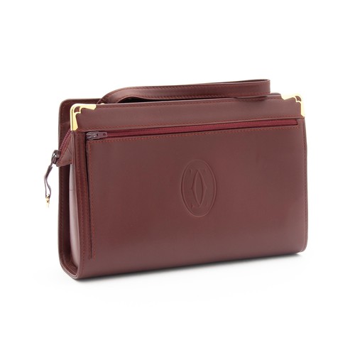 593 - A 1970'S CARTIER BURGUNDY BAG