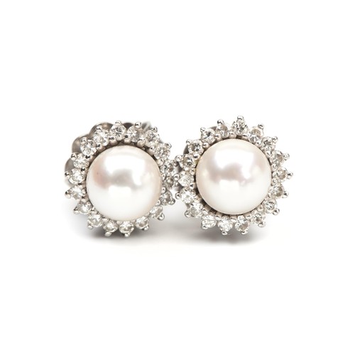 166 - A PAIR OF PEARL AND DIAMOND EARRINGS