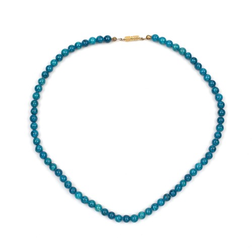 91 - A STRAND OF TURQUOISE BEADS