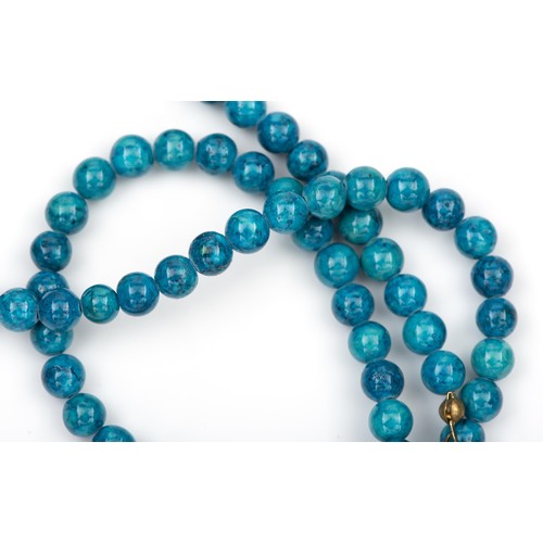 91 - A STRAND OF TURQUOISE BEADS