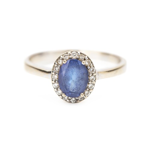 149 - A TANZANITE AND DIAMOND DRESS RING