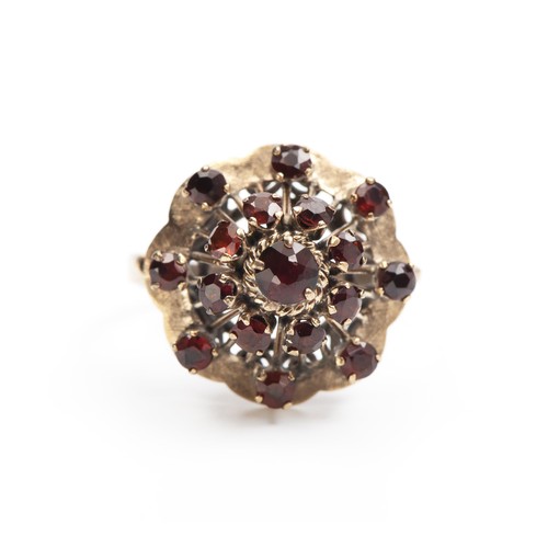 155 - A GARNET DRESS RING