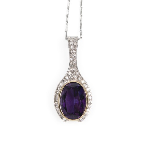 54 - AN AMETHYST AND DIAMOND PENDANT