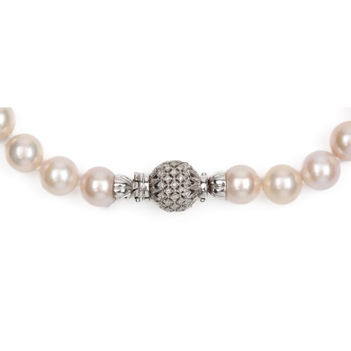 97 - A PEARL AND DIAMOND NECKLACE