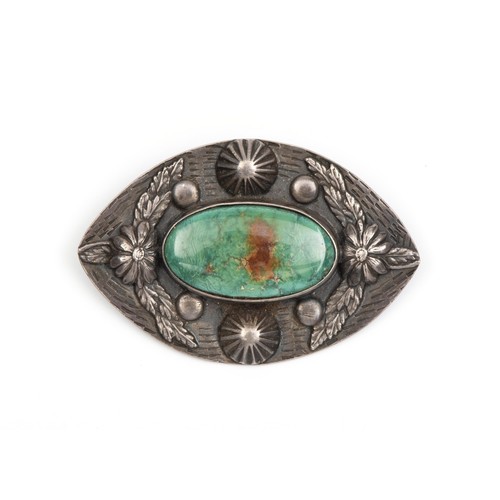 67 - A SILVER AND TURQUOISE BROOCH