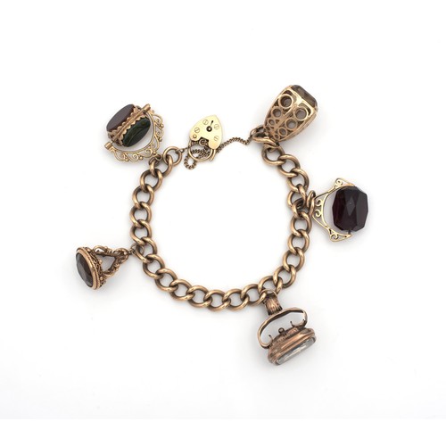 122 - A GOLD CHARM BRACELET