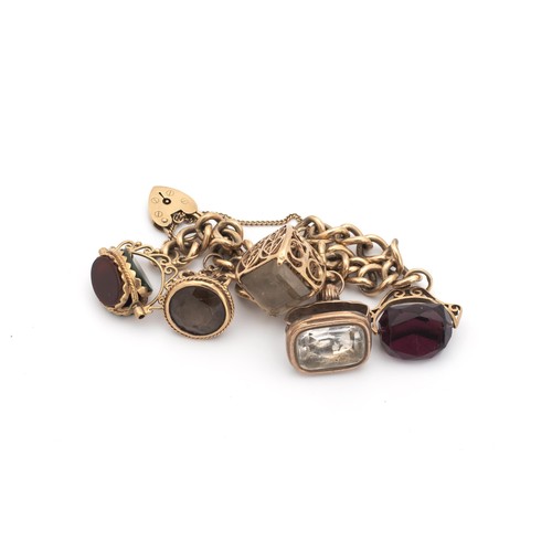 122 - A GOLD CHARM BRACELET