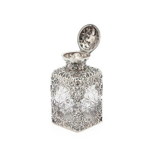 982 - A VICTORIAN SILVER-MOUNTED AND GLASS PERFUME BOTTLE, GOLDSMITHS & SILVERSMITHS, LONDON, 1899