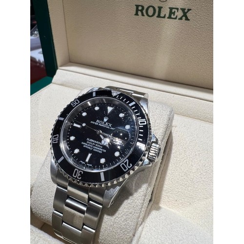 31B - A GENTLEMAN'S STAINLESS-STEEL WRISTWATCH, ROLEX SUBMARINER