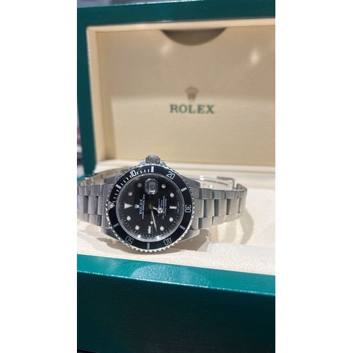 31B - A GENTLEMAN'S STAINLESS-STEEL WRISTWATCH, ROLEX SUBMARINER