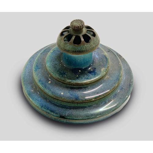 414 - A LINN WARE BLUE-GLAZE CANLESTICK HOLDER AND COVER