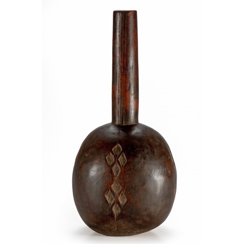 77 - AN EAST AFRICAN WOODEN VESSEL