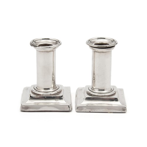 979 - A PAIR OF VICTORIAN SILVER CANDLESTICKS, JANE BROWNETTE, LONDON, 1895