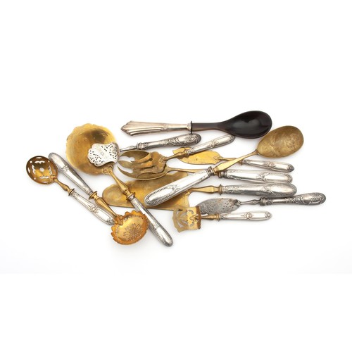 942 - A SET OF ELECTROPLATE  AND GILT CUTLERY