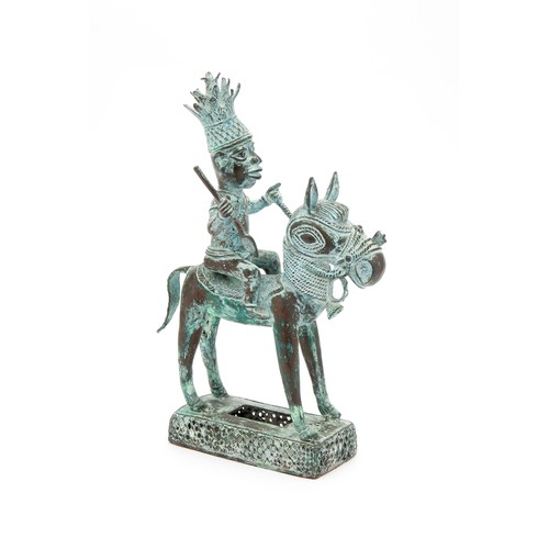 738 - AN AFRICAN BRONZE FIGURE OF A HORSE AND RIDER