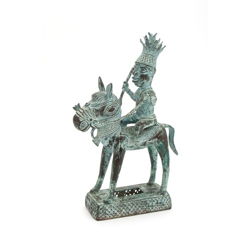 738 - AN AFRICAN BRONZE FIGURE OF A HORSE AND RIDER