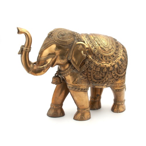 746 - A BRASS FIGURE OF AN ELEPHANT