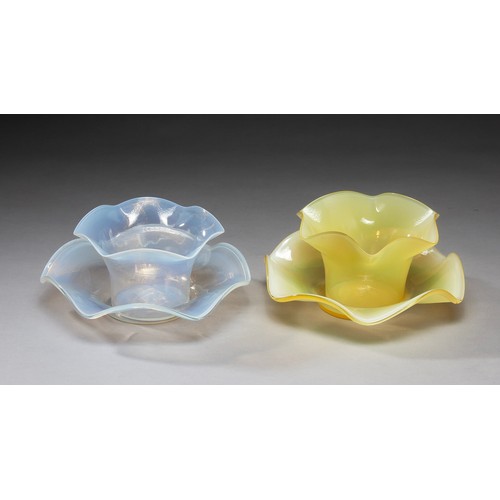 679 - TWO GLASS VASES AND MATCHING SAUCERS