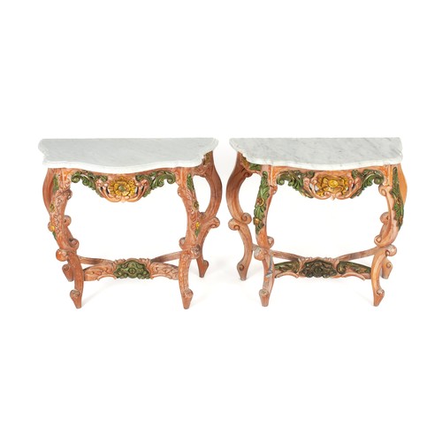 223 - A PAIR OF BALINESE MARBLE-TOPPED CONSOLE TABLES