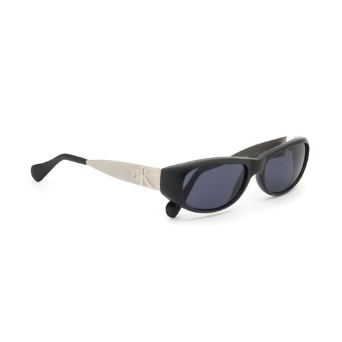 584 - A PAIR OF CALVIN KLEIN SUNGLASSES