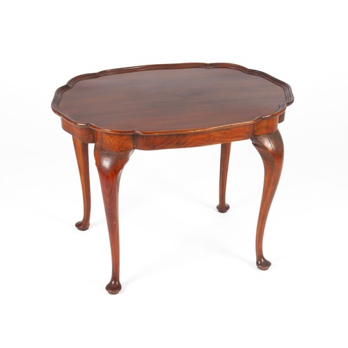 275 - A MAHOGANY COFFEE TABLE