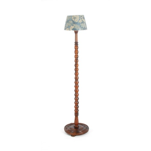 388 - A WALNUT STANDARD LAMP