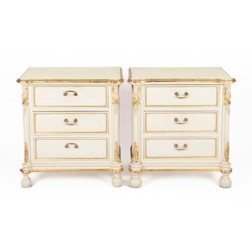 287 - A PAIR OF WHITE-PAINTED AND GILT BEDSIDE CHEST OF DRAWERS