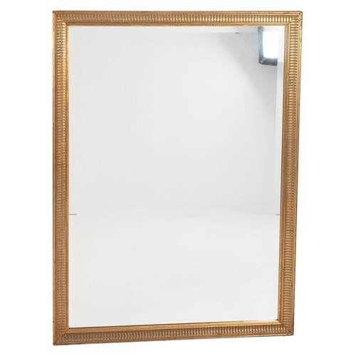 260 - A RECTANGULAR GILT-WOOD WALL MIRROR