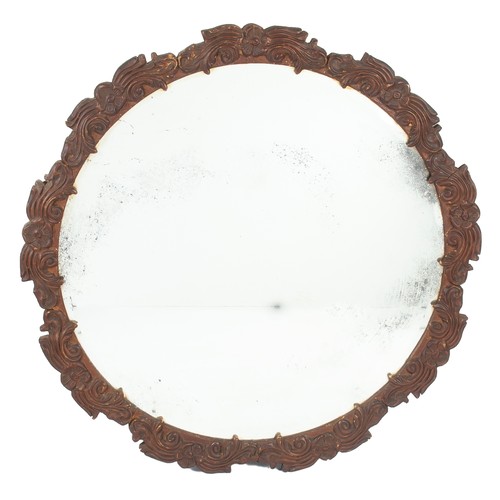 263 - A CARVED-WOOD CIRCULAR WALL MIRROR