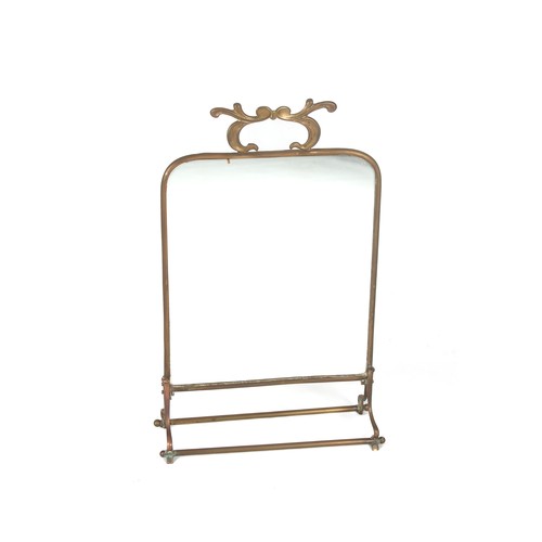 257 - A BRASS FRAMED TABLE MIRROR