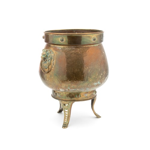 677 - A BRASS FLOOR VASE