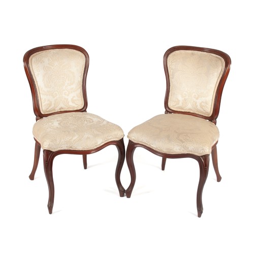 172 - A SET OF FOUR VICTORIAN-STYLE WALNUT SIDE CHAIRS