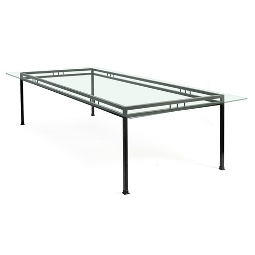 375 - A GLASS TOPPED PATIO DINING TABLE