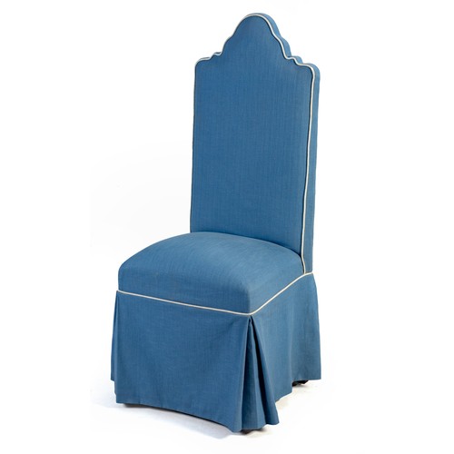 348 - AN UPHOLSTERED HIGH-BACKED CHAIR