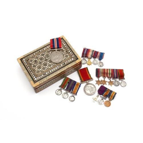 142 - A COLLECTION OF MEDALS WITH ACCOMPANYING TRINKET BOX