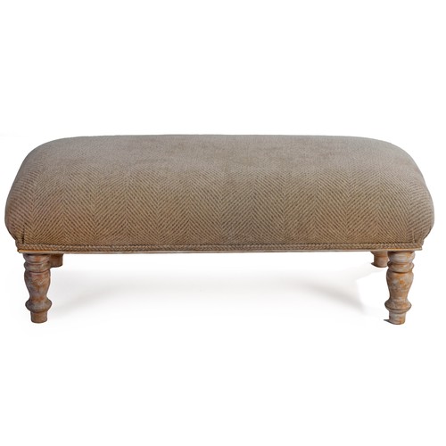 243 - AN UPHOLSTERED OTTOMAN