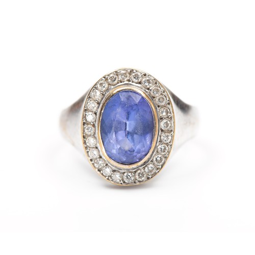 1206 - A TANZANITE AND DIAMOND DRESS RING