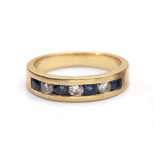 1210 - A DIAMOND AND SAPPHIRE ETERNITY RING