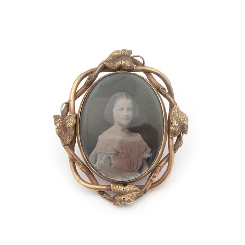 629 - A PORTRAIT PENDANT BROOCH