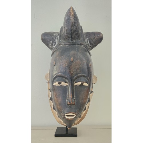 7 - A BAULE KPAN KPAN MASK, IVORY COAST