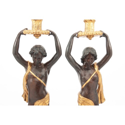 638 - A PAIR OF BRONZE BLACKAMOOR TORCHERES