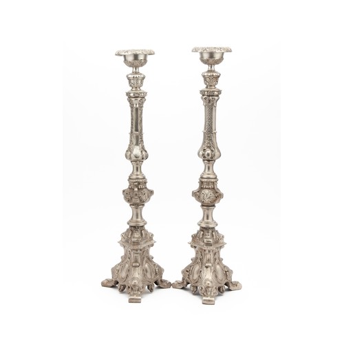 639 - A PAIR OF SILVERED ALTAR CANDLESTICKS, MODERN