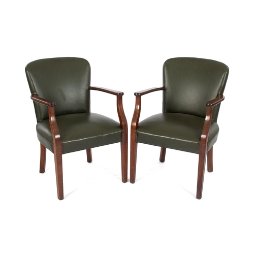 63 - A PAIR OF LEATHER UPHOLSTERED ARMCHAIRS