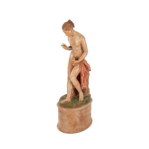 587 - A LARGE CERAMIC FIGURAL SCULPTURE ON A TERRACOTTA BASE