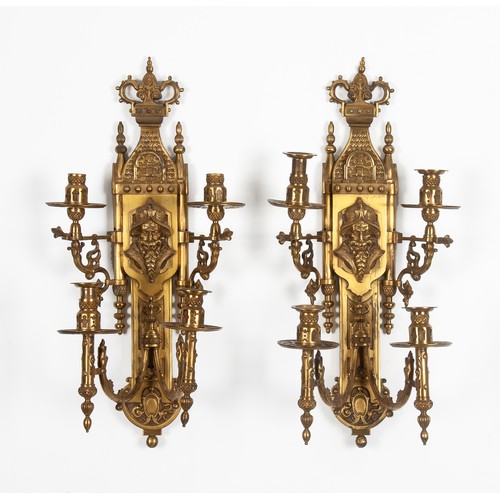 636 - A PAIR OF FOUR-CANDLE BRASS BRACKETS