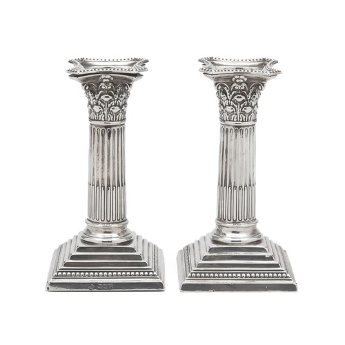 731 - A PAIR OF SILVER CANDLE STICKS, LONDON, 1910